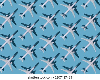 Airplane Background. Flights, Travel And Aviation. Pattern Of White Planes On A Blue Background. The Passenger Plane Is Flying. Air Transport Concept.