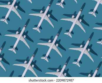 Airplane Background. Flights, Travel And Aviation. Pattern Of White Planes On A Blue Background. The Passenger Plane Is Flying. Air Transport Concept.