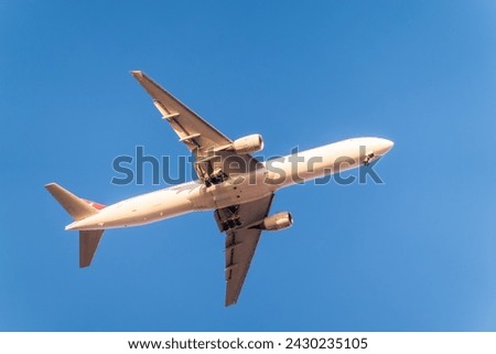 Airplane before landing in blue sky, Airbus A330. Air Transport. Tourism and travel concept.