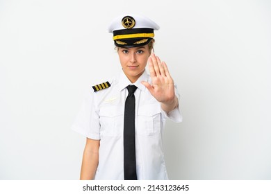 Airplane Blonde Woman Pilot Isolated On White Background Making Stop Gesture