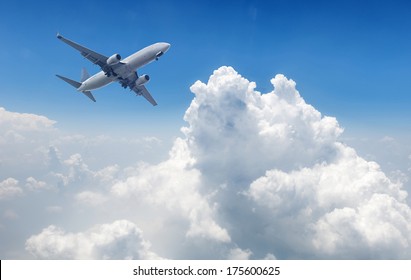 Airplane And Blue Cloudy Sky