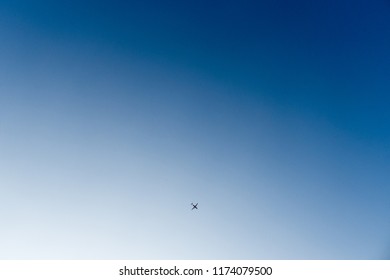 Airplane in the cloudless sky