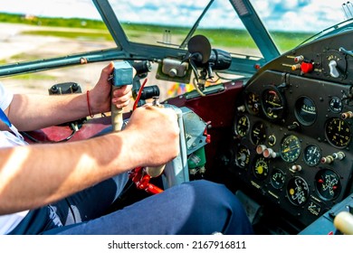 Airplane Cockpit. Aircraft Dashboard And Steering Wheel In Selective Focus.