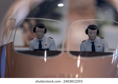 Airplane cockpit model with pilots front view  - Powered by Shutterstock