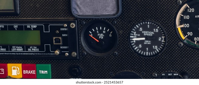 Airplane dashboard, fuel indicator. Fuel pump icon. gas gauge dashboard in Plane with warning sign of run out of fuel turn on. Low level of fuel show on speedometer dashboard.