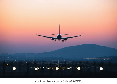 An airplane departing from airport during sunset - Powered by Shutterstock