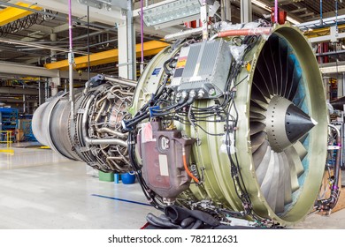 An Airplane Engine During Maintenance In A Warehouse