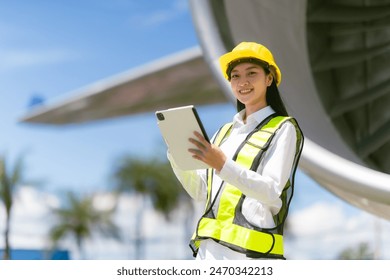 Airplane engine repair technician, aerospace engineering woman, engine inspection, maintenance technician - Powered by Shutterstock