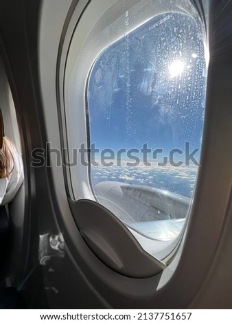 Airplane engine through the window. 