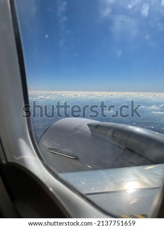 Airplane engine through the window. 