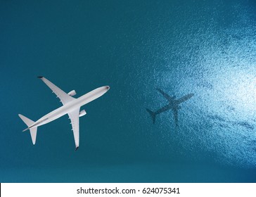 Airplane Flies Over A Sea, View From Above