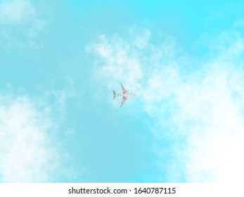 airplane flying between dense clouds