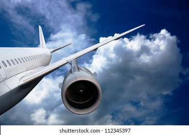 Airplane Flying Down. Against The Sky.  Landing Or Crash Of Airplane