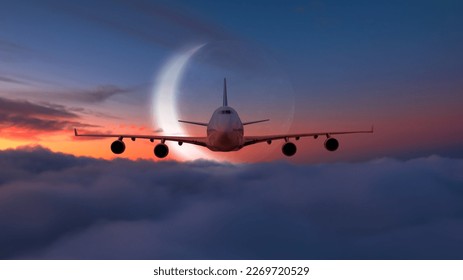 Airplane flying over tropical sea with crescent moon at amazing sunset - Powered by Shutterstock