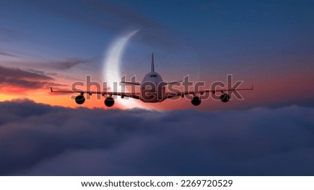 Airplane flying over tropical sea with crescent moon at amazing sunset