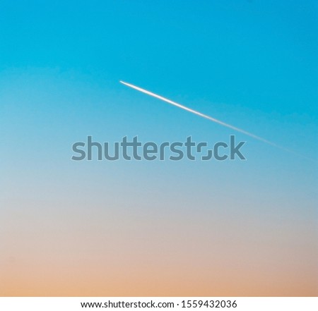airplane flying trajectory on the beautiful background
