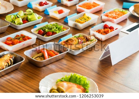 variety to the presentation of food Airplane food presentation with variety of in flight meals stock.