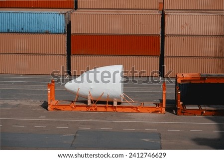 Airplane Fuselage Loaded And Lashed In The Flat Rack Container For International Transportation