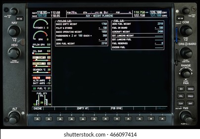 Airplane glass cockpit display with  engine gauges  in small private airplane