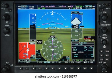 Airplane Glass Cockpit Display With Terrain And Engine Gauges In Small Private Airplane