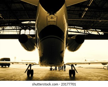 Airplane In Hanger, (back).