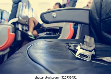 Airplane Interior. Close Up Of Safety Belt On Seat.