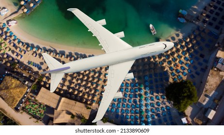 Airplane Landing Above Beautiful Beach And Sea Background