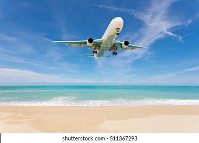 Airplane Landing Above Beautiful Beach And Sea Background