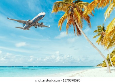 Airplane Landing At A Caribbean Resort