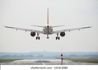 Airplane Is Landing On The Airport