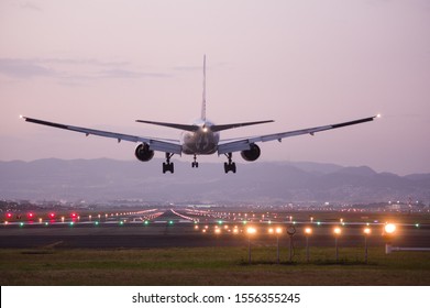 Airplane Landing On Runway Stock Photo 1556355245 | Shutterstock