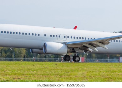 Airplane Landing On Runway Touchdown Close Up Side View Fuselage