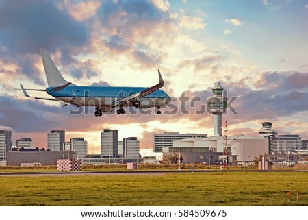 Airplane landing on Schiphol airport in Amsterdam in the Netherlands
