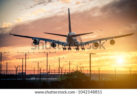 Airplane landing on the track