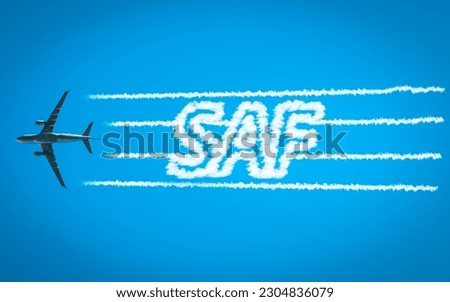 Airplane leaving jet contrails with SAF word inside