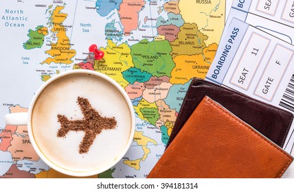 Airplane made of cinnamon in cappuccino, passports, Europe map and no name boarding pass. 
Marked point of destination - Germany - Powered by Shutterstock