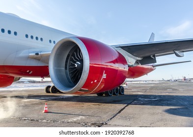Airplane on the ground engine view. Airliner turbofan jet engine.