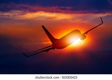 Airplane On Sunset.