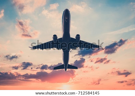  airplane on sunset sky  - aircraft, jet  on scenic sky background