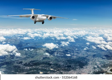 Airplane over the clouds.