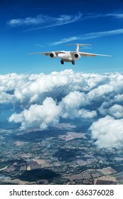 Airplane over the clouds.