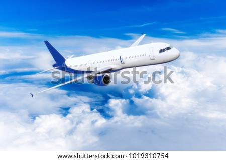 Airplane over the clouds
