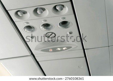 Airplane Overhead Panel with Reading Lights and No Smoking Sign