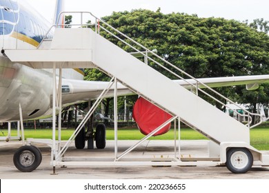 Airplane  With Passenger Stairs