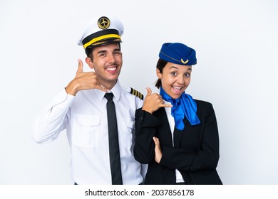 Airplane Pilot And Mixed Race Air Hostess Isolated On White Background Making Phone Gesture. Call Me Back Sign