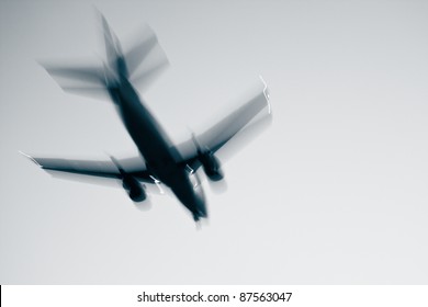 Airplane with problems - concept and idea - blurred motion