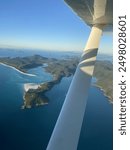 An airplane ride over Whitsunday Island in Queensland, Australia