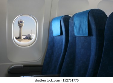 Airplane Seat And Window Inside An Aircraft