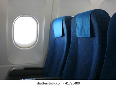 Airplane Seat And Window Inside An Aircraft