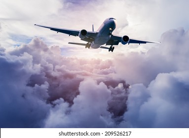 Airplane in the sky - Shutterstock ID 209526217